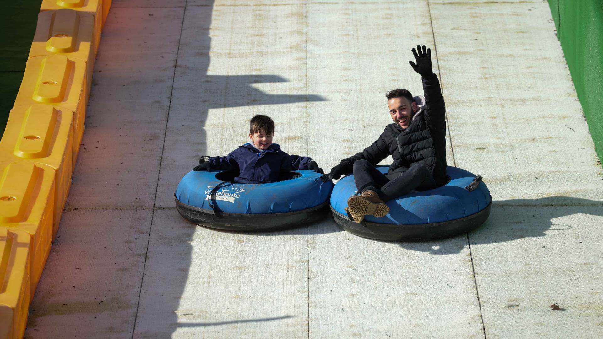 Dad and son on slide