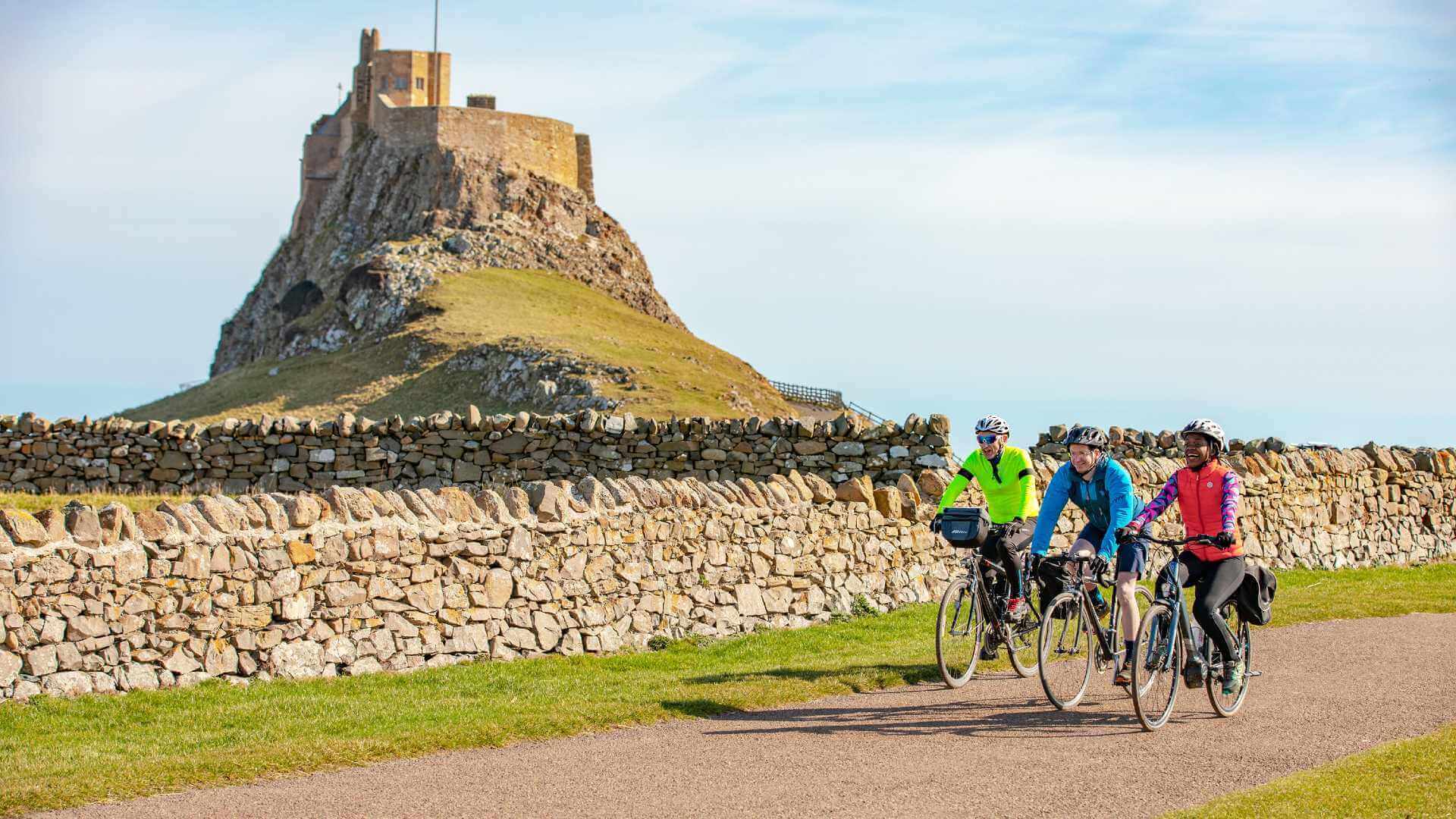 Cyclists at Lindisfarne Castle