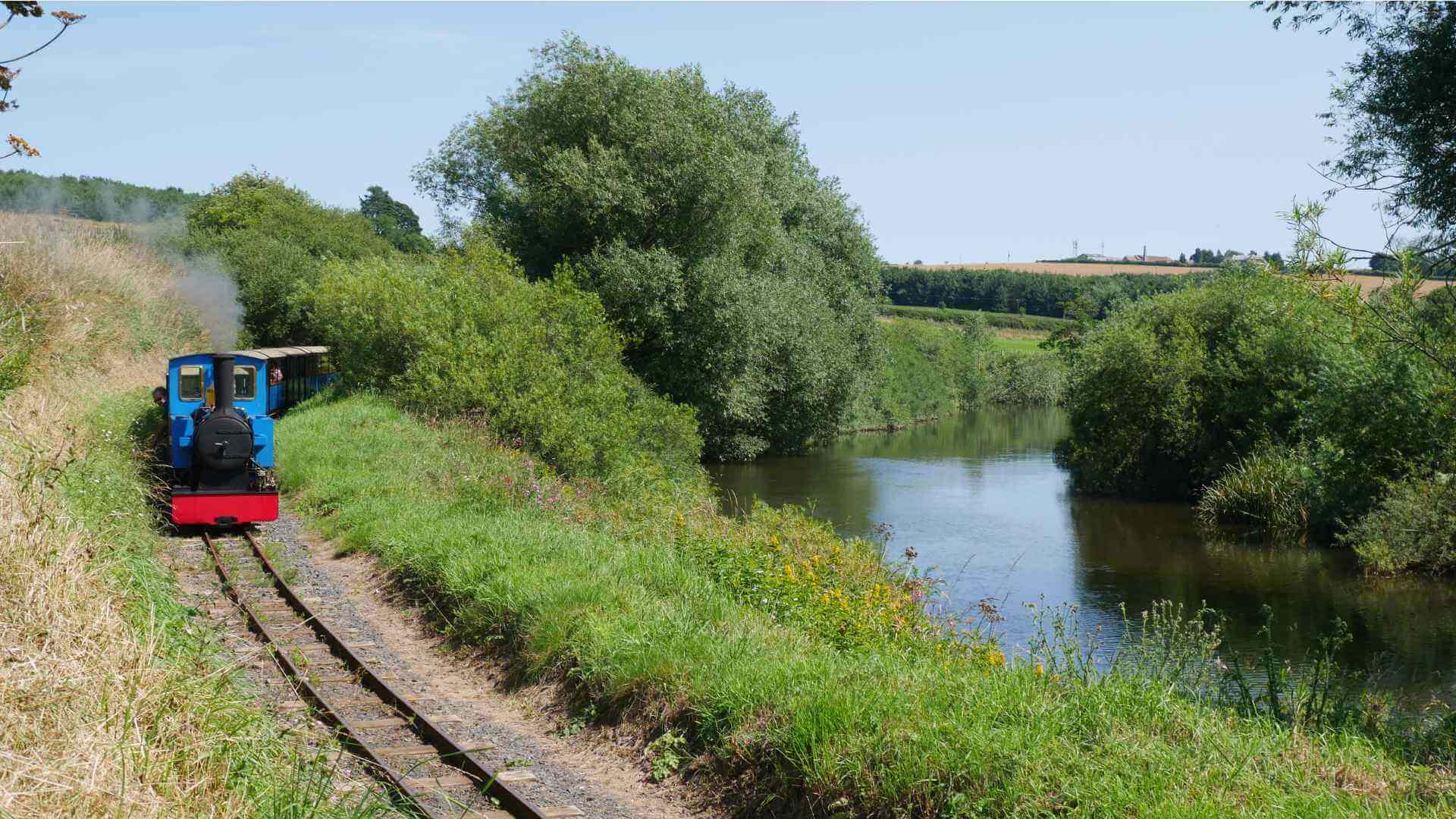 Train ride by the river