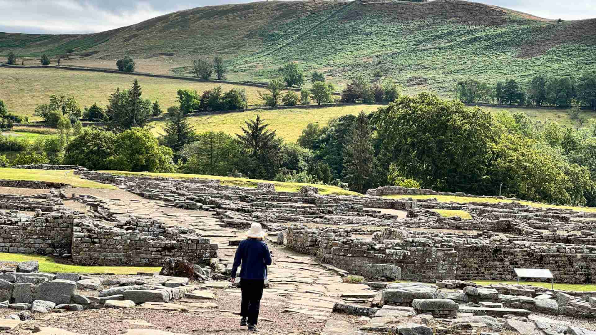 Visitor exploring Vindolanda