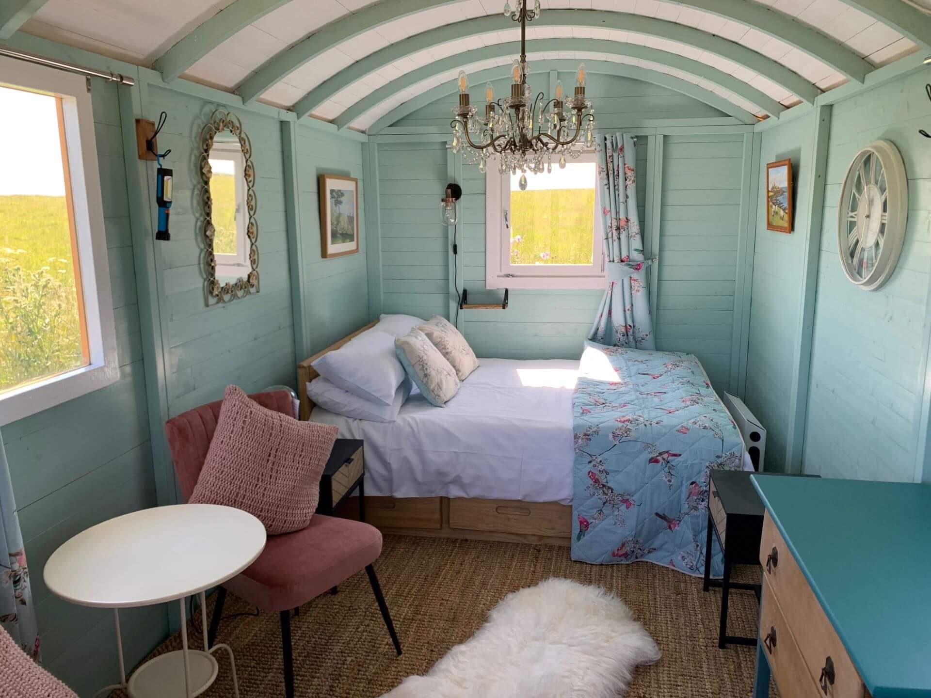 Inside Shepherd's hut - double bed