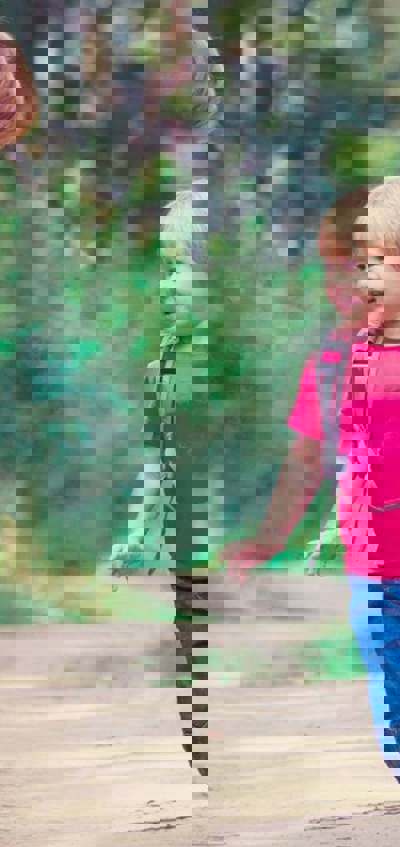 family-walks-wooden-star